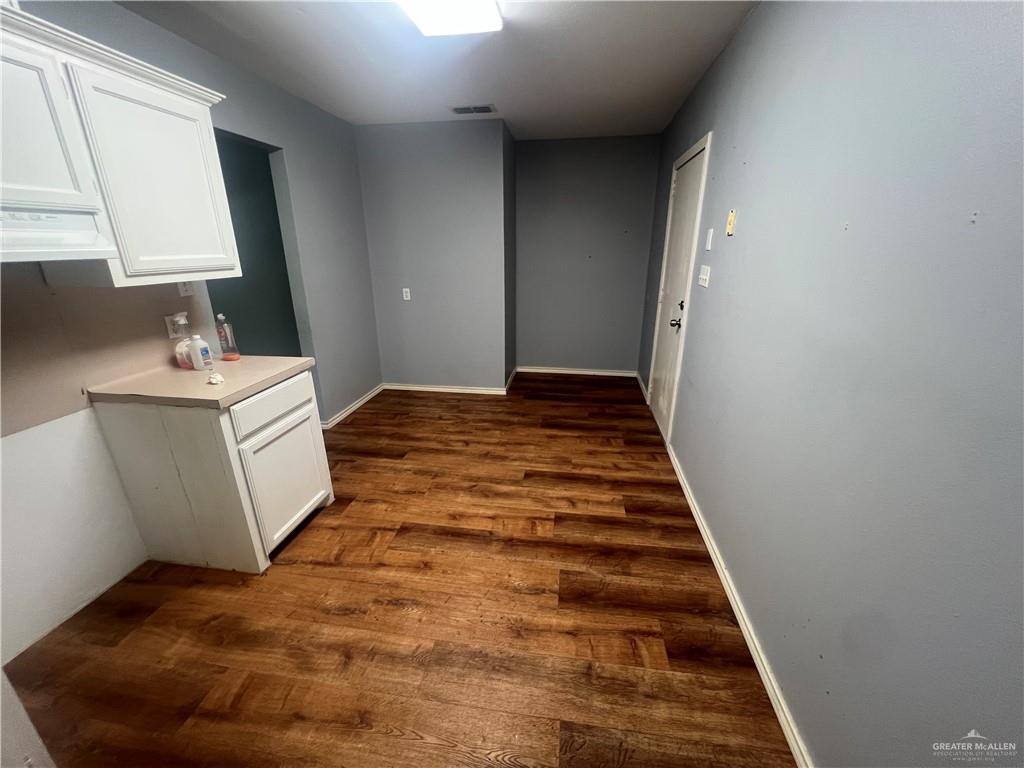 329 North 8th Street McAllen, TX 78501 - Photo 6 of 13 a view of bathroom with sink and mirror