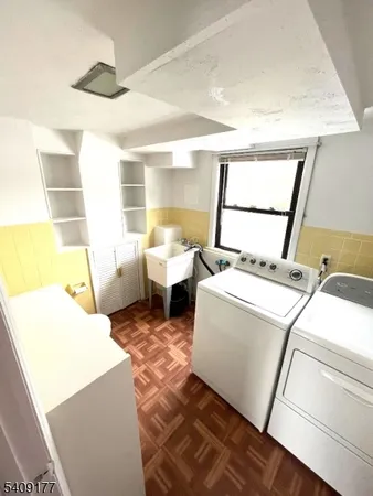 a living room with couches and furniture