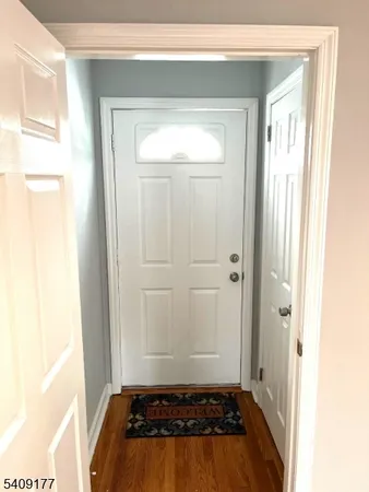 a bathroom with a tub and shower