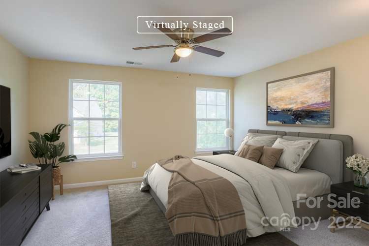 6154 Trotters Ridge Road Charlotte, NC 28227 - Photo 3 of 28 a bedroom with a bed and window