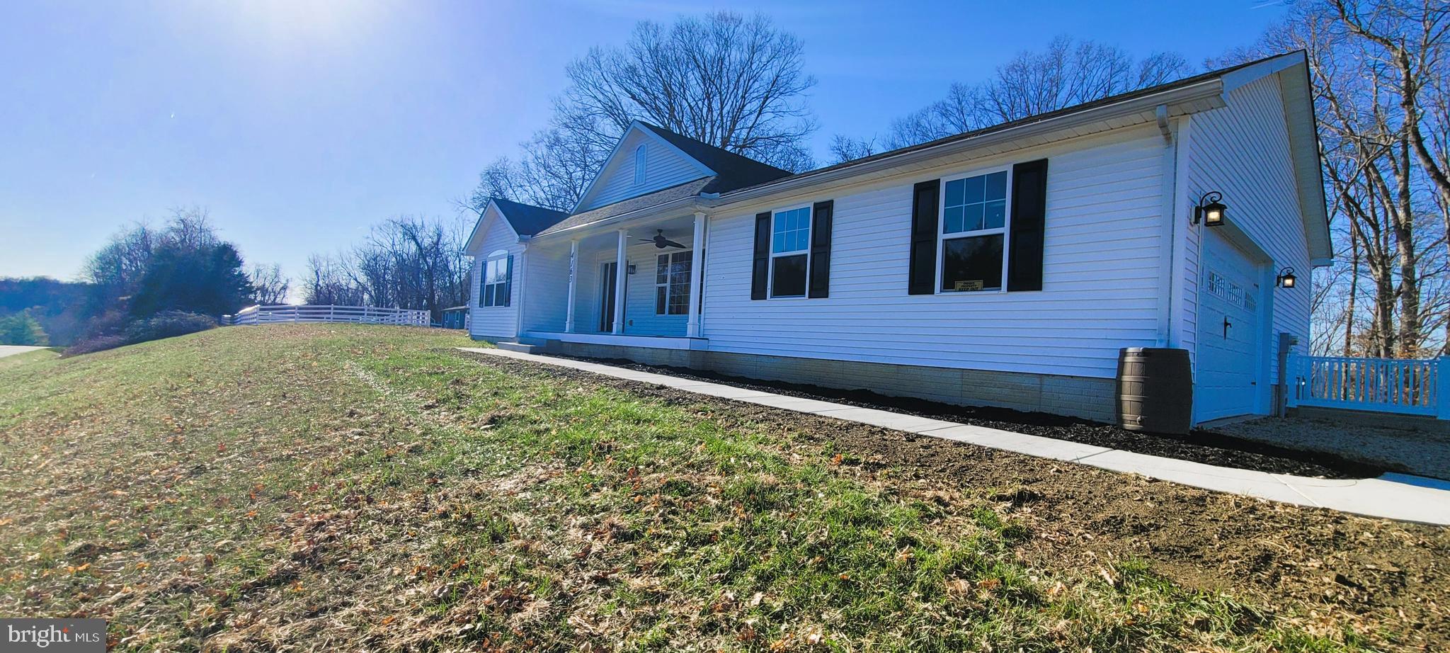 4163 Telegraph Road Elkton, MD 21921 - Photo 5 of 23 a front view of a house with a yard
