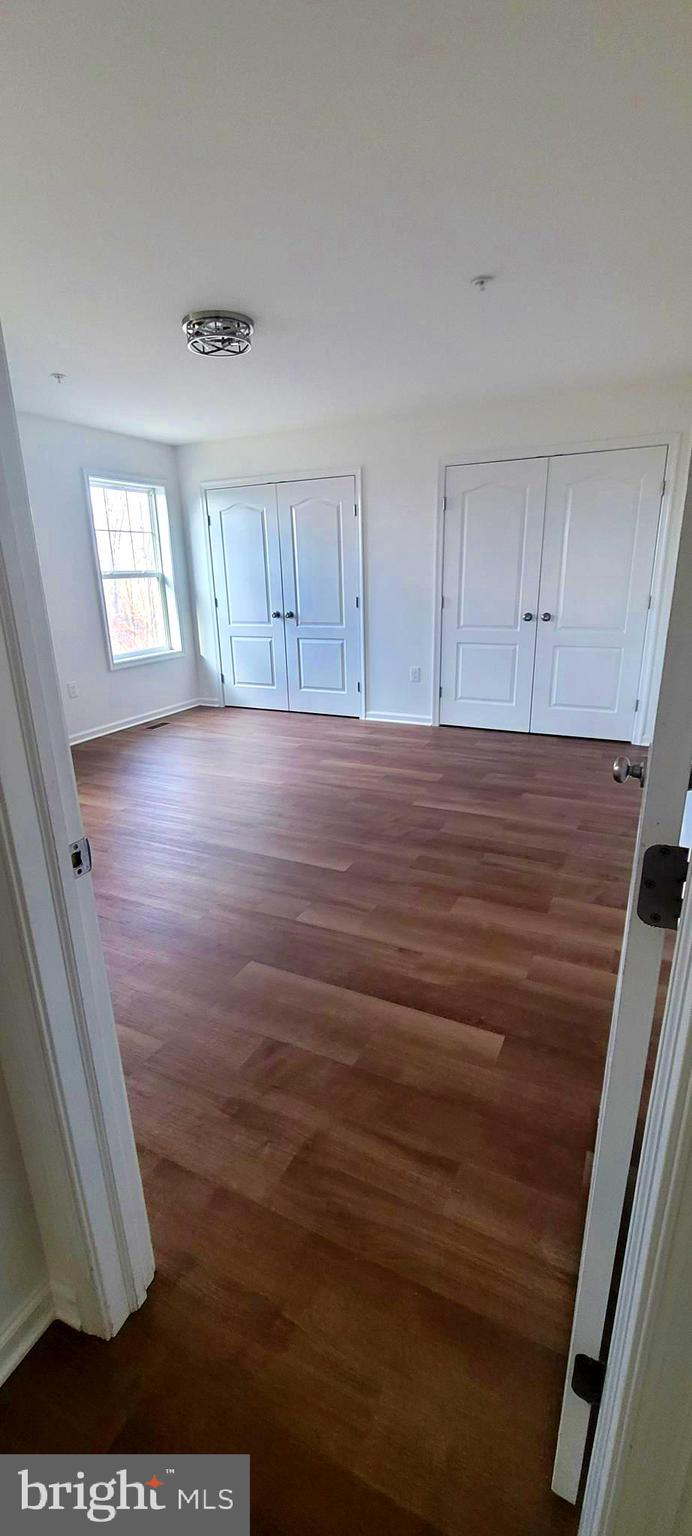 4163 Telegraph Road Elkton, MD 21921 - Photo 9 of 23 wooden floor in an empty room