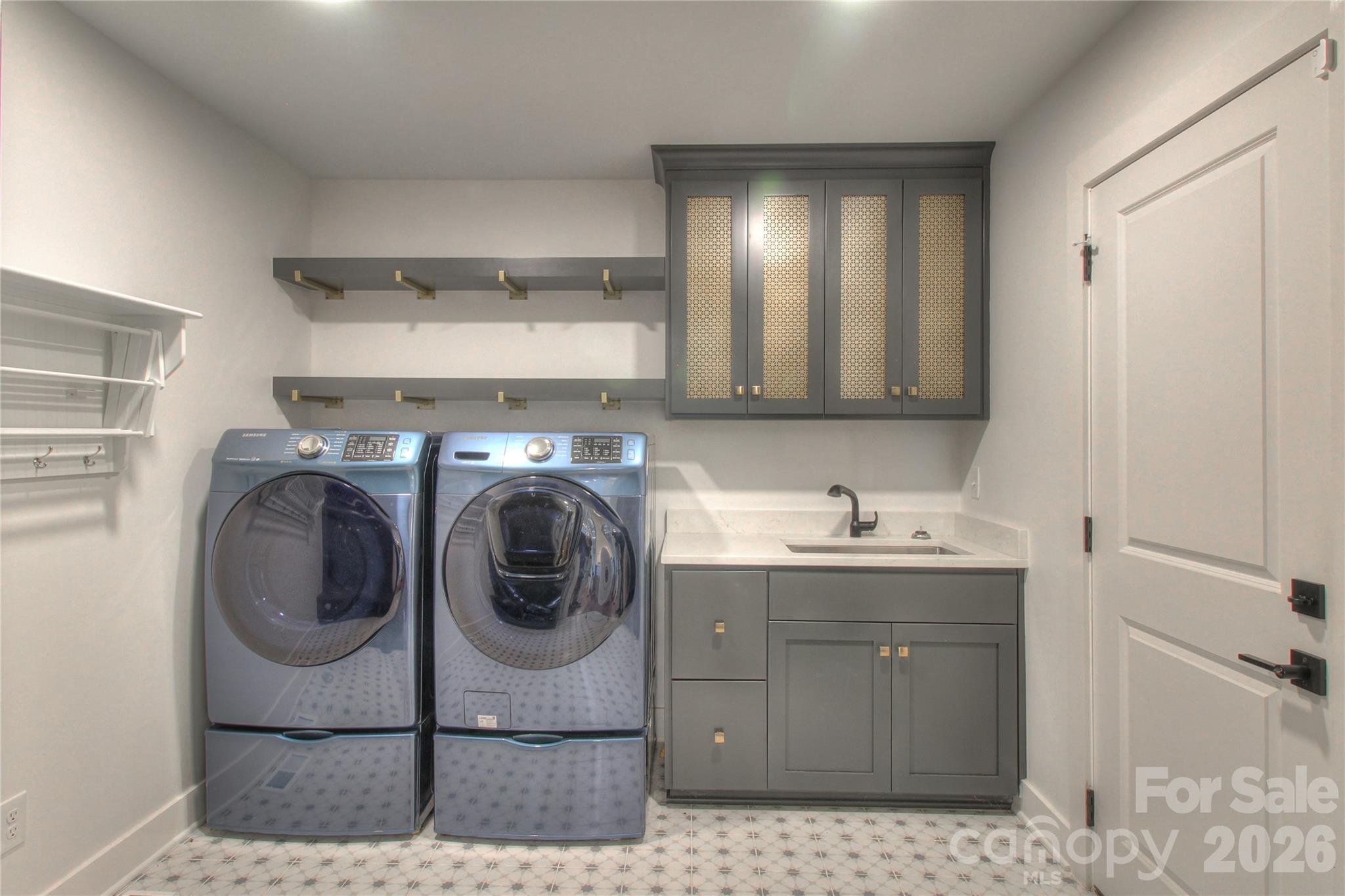 3408 Providence Manor Road Charlotte, NC 28270 - Photo 35 of 39 a utility room with cabinets washer and dryer