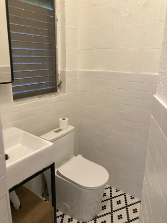 a bathroom with a sink and a shower