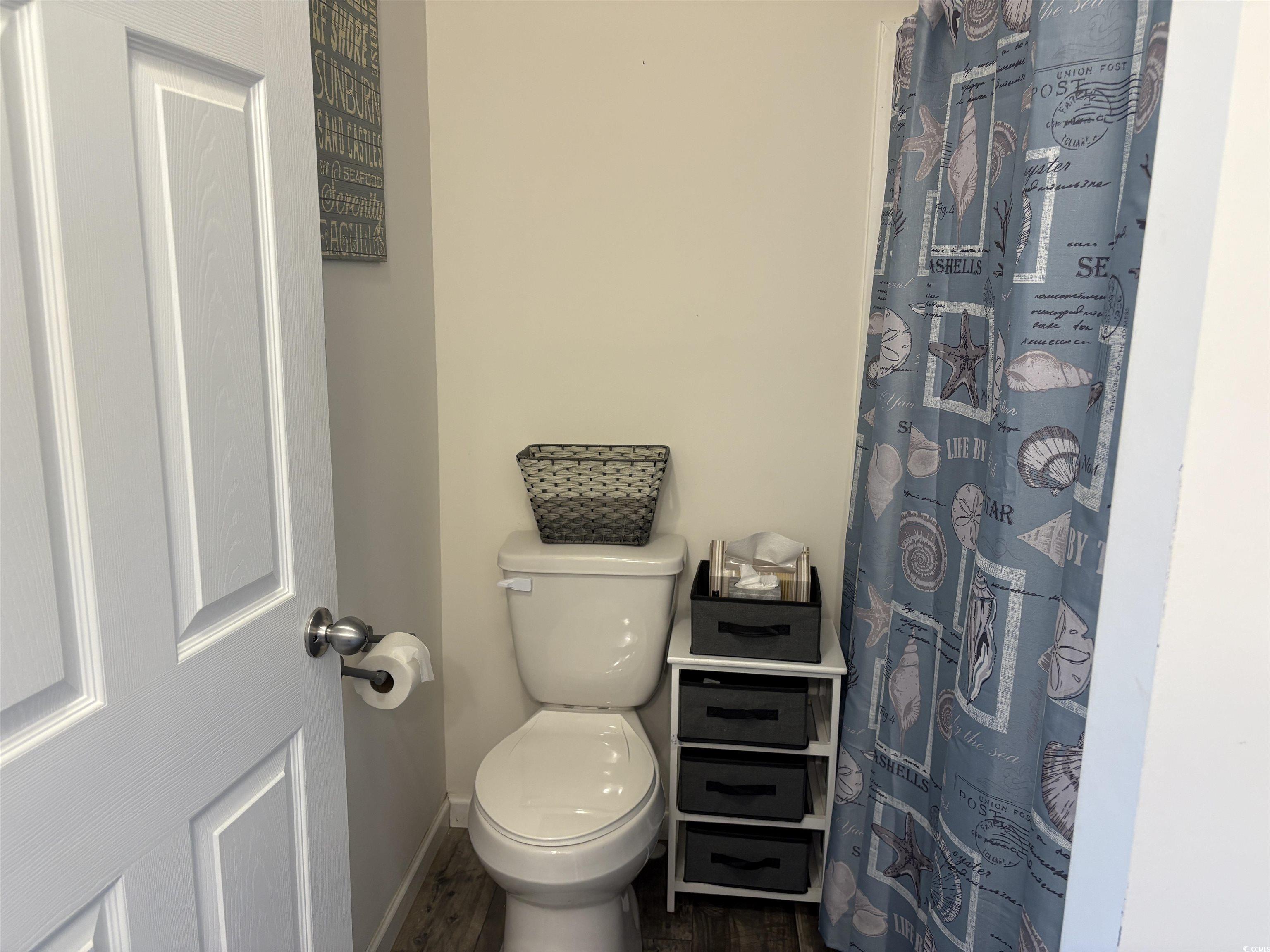 3248 Pecan Trail Murrells Inlet, SC 29576 - Photo 20 of 29 Spacious closet featuring dark wood-style flooring