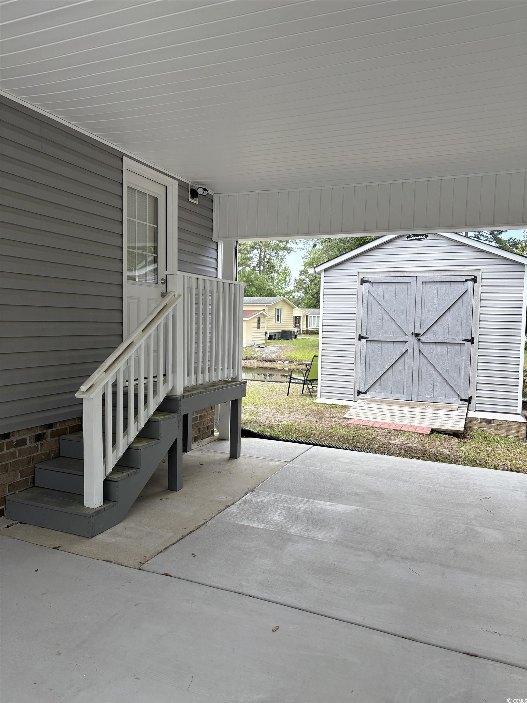 3248 Pecan Trail Murrells Inlet, SC 29576 - Photo 21 of 29 Bathroom with double vanity and ornamental molding