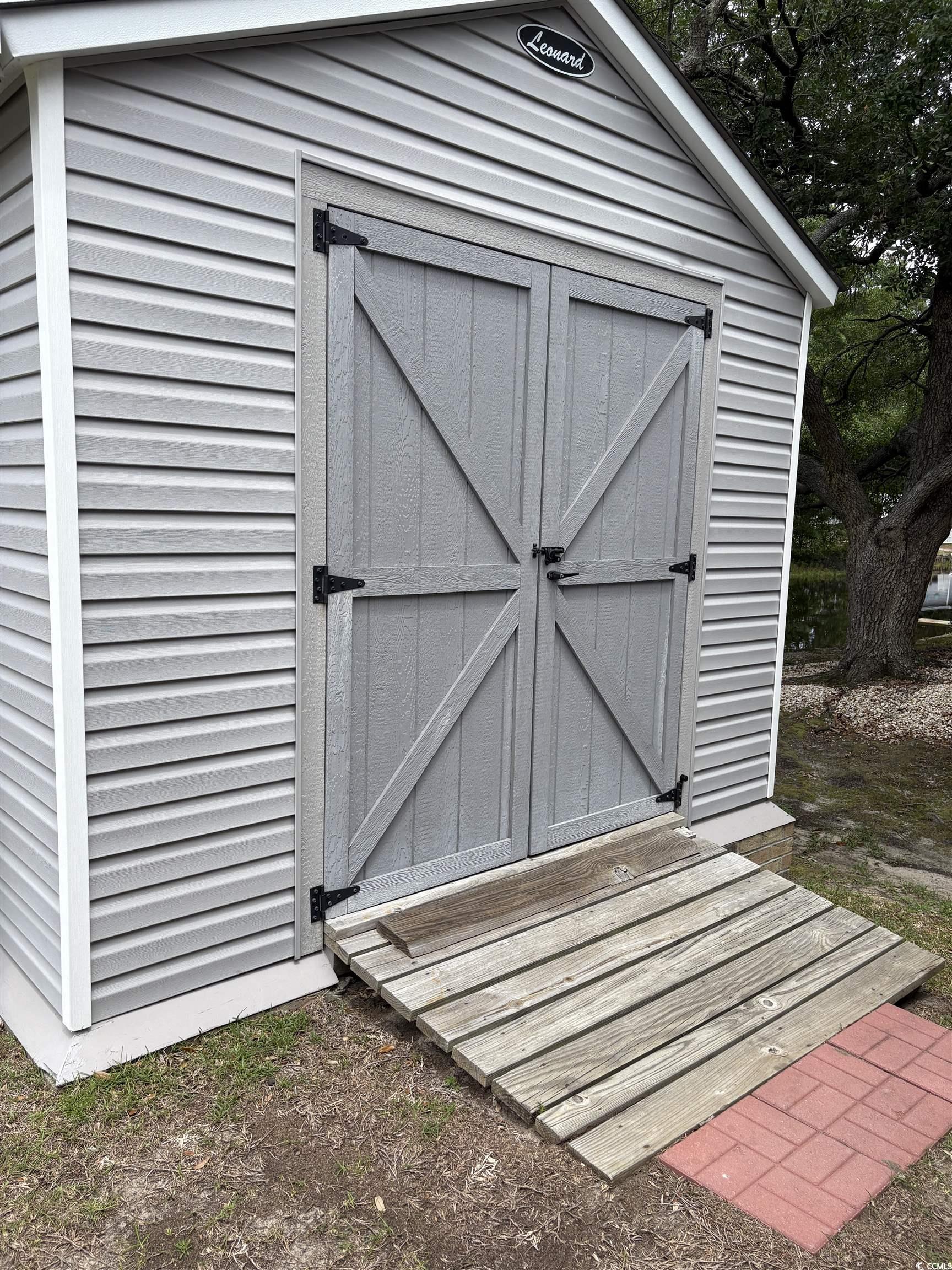 3248 Pecan Trail Murrells Inlet, SC 29576 - Photo 22 of 29 Full bathroom featuring wood finished floors, base