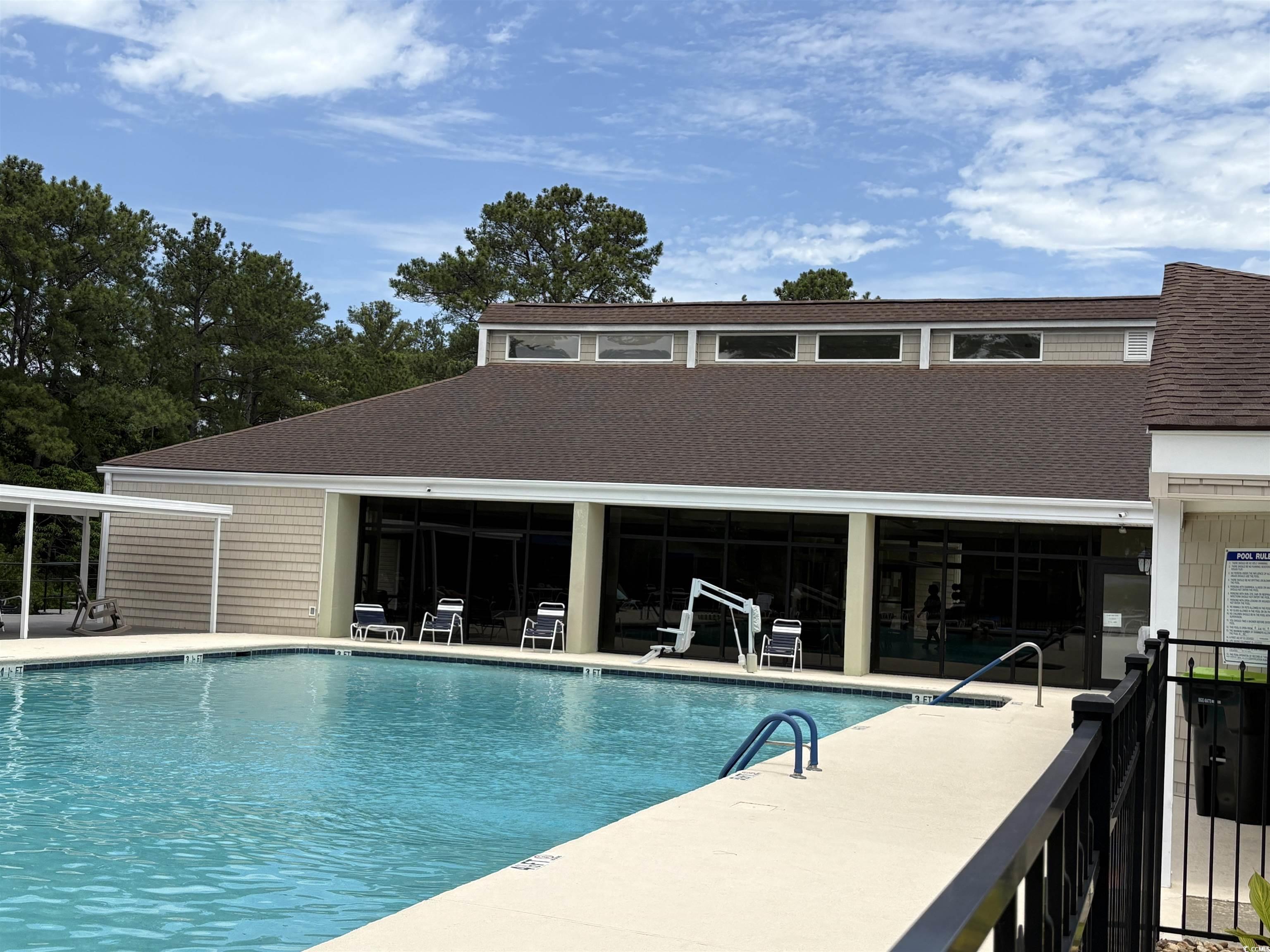 3248 Pecan Trail Murrells Inlet, SC 29576 - Photo 28 of 29 View of grassy yard with a patio area and a water