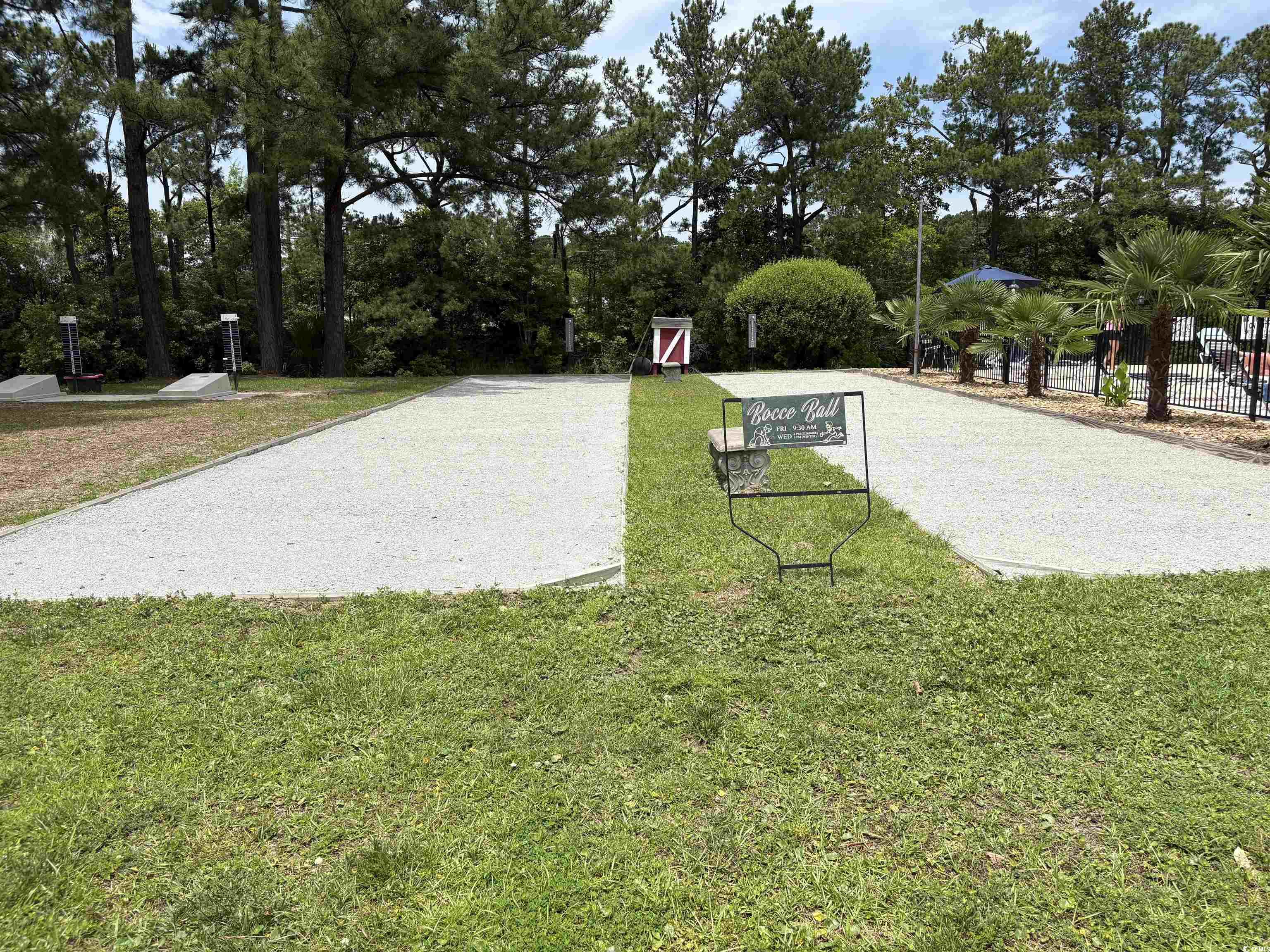 3248 Pecan Trail Murrells Inlet, SC 29576 - Photo 29 of 29 View of patio with a water view, an outbuilding, o