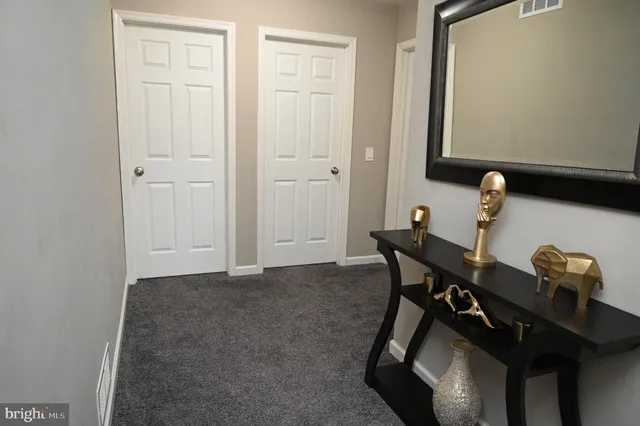 a view of a workspace with furniture