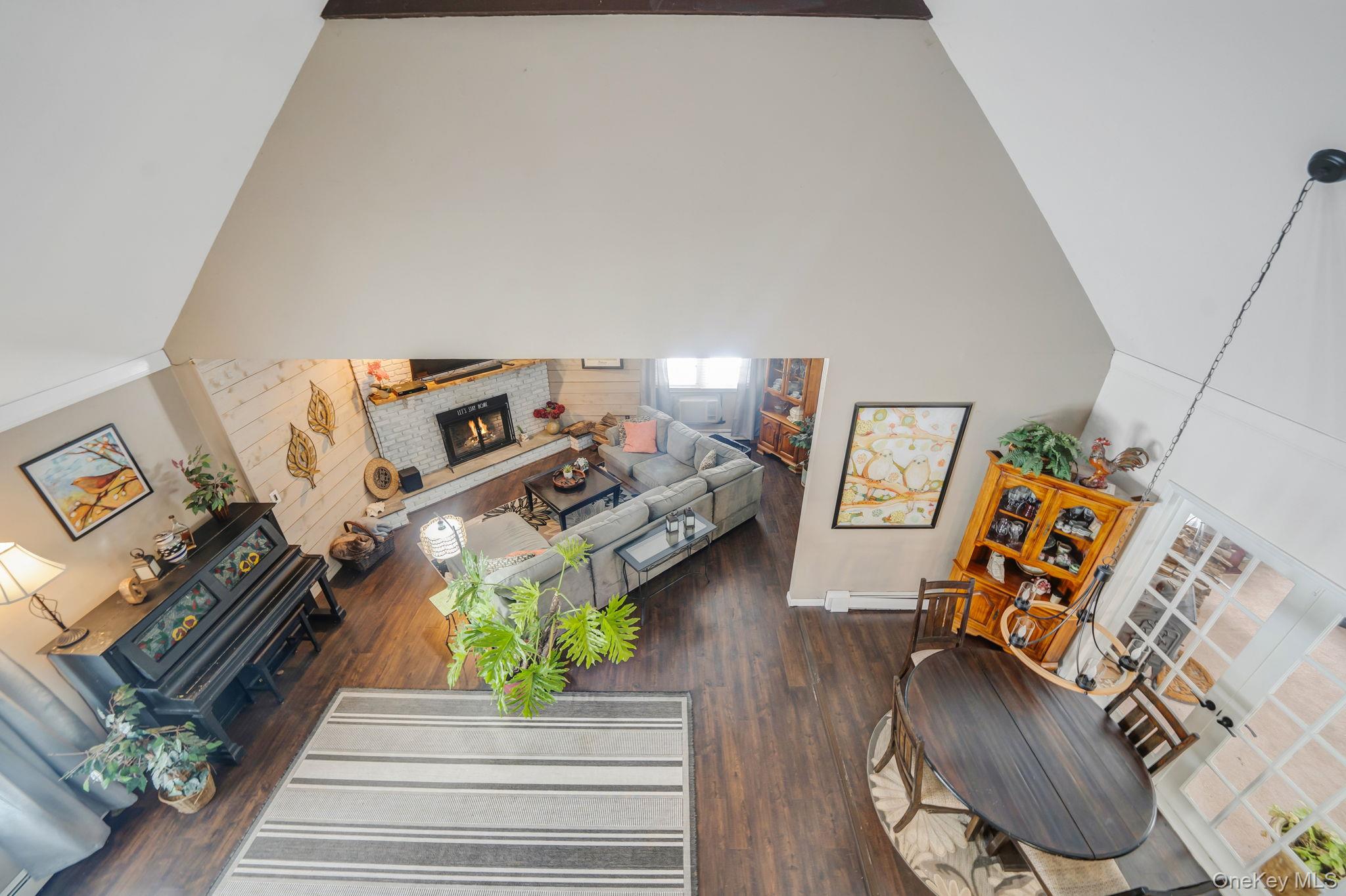 6 Howe Court Coram, NY 11727 - Photo 6 of 17 a view of a living room and entryway