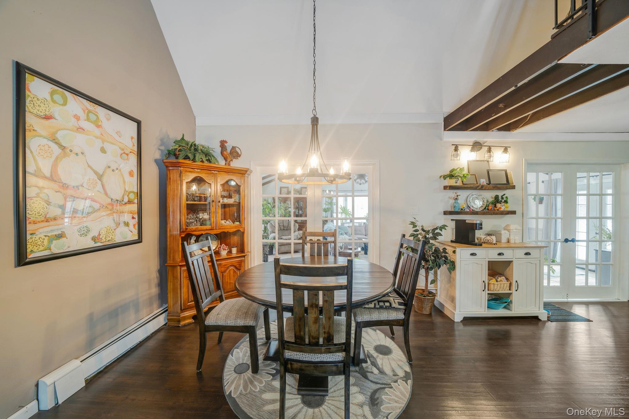 6 Howe Court Coram, NY 11727 - Photo 7 of 17 a view of a dining room with furniture window and wooden floor
