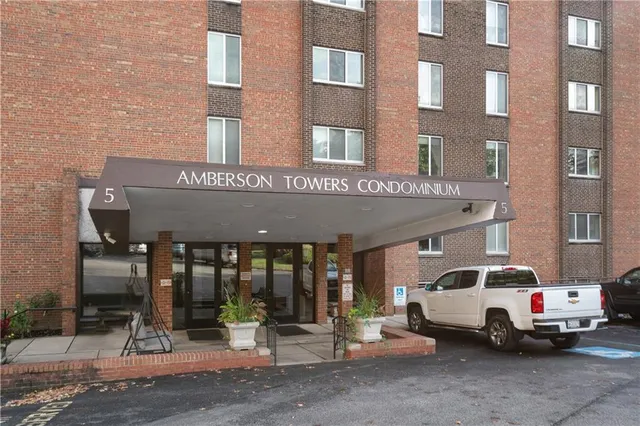 a view of a car park in front of building