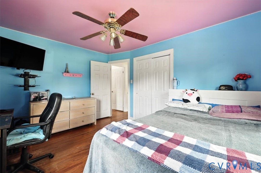 11310 Celtic Road Chesterfield, VA 23838 - Photo 17 of 21 a bedroom with a bed and a flat screen tv