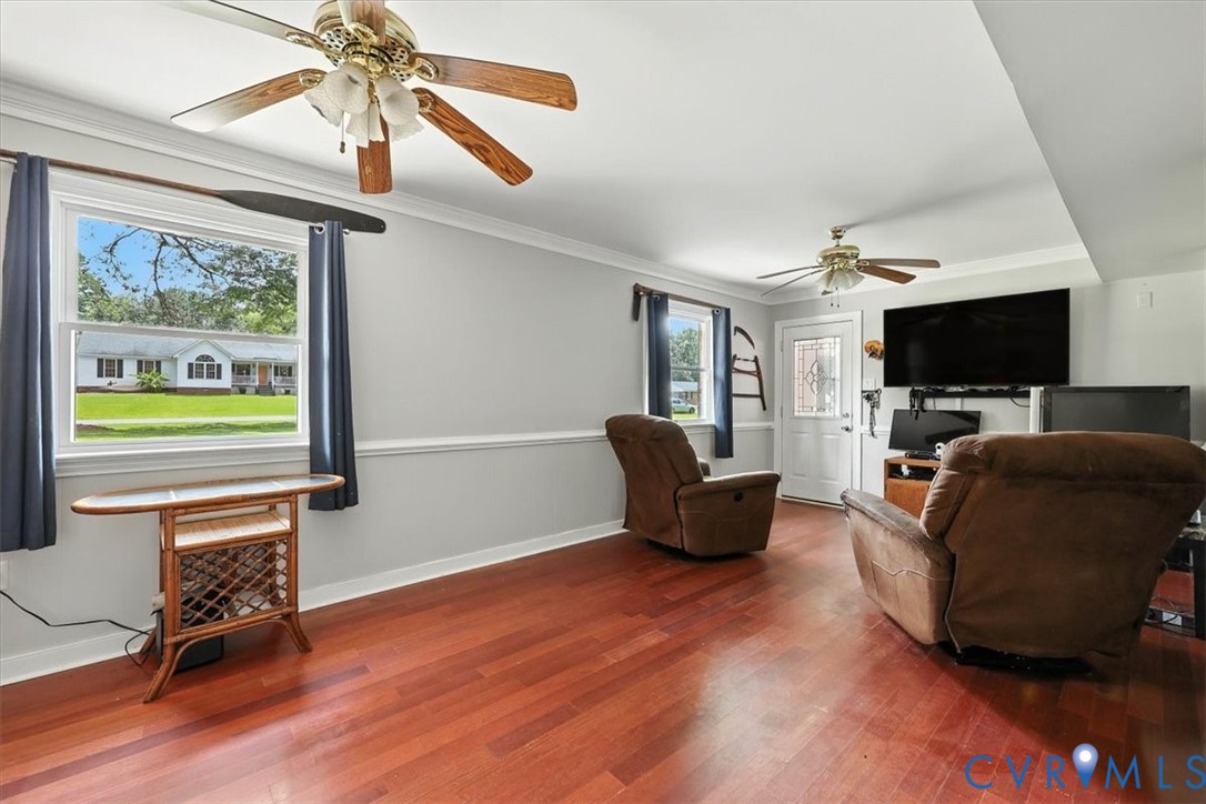 11310 Celtic Road Chesterfield, VA 23838 - Photo 20 of 21 a living room with furniture and a flat screen tv