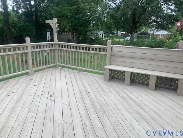 11310 Celtic Road Chesterfield, VA 23838 - Photo 5 of 21 a view of deck with a table and chairs and wooden floor