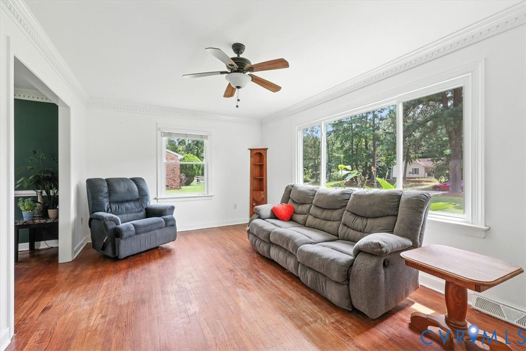 11310 Celtic Road Chesterfield, VA 23838 - Photo 7 of 21 a living room with furniture and a large window