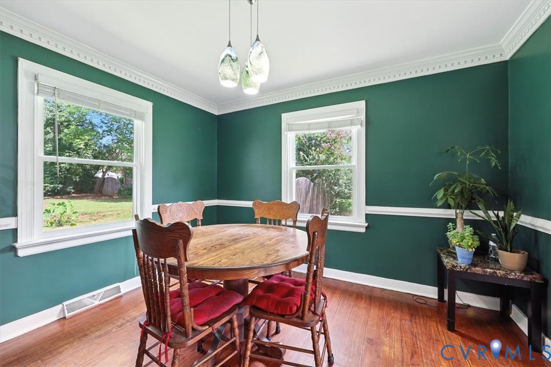 11310 Celtic Road Chesterfield, VA 23838 - Photo 8 of 21 a view of a dining room with furniture window and wooden floor