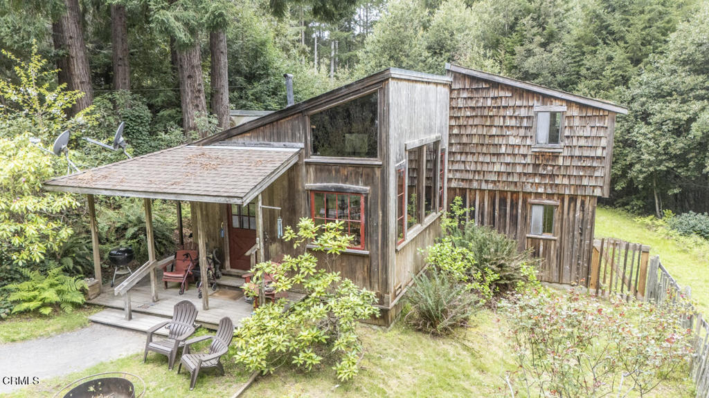 a house view with a garden space