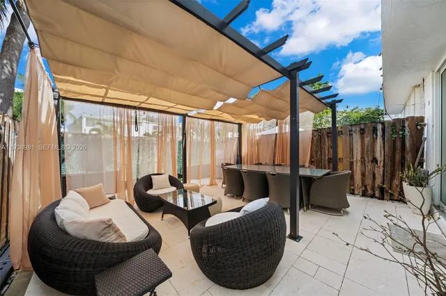 a balcony with furniture and a couch