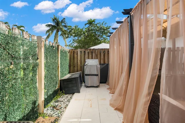 a view of balcony with patio