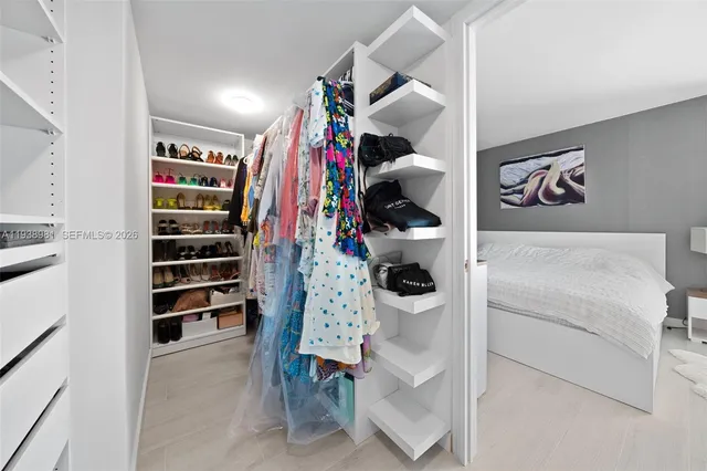 a storage room with washer and dryer