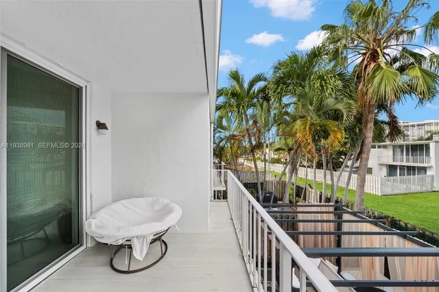 a view of an outdoor space with seating area and furniture