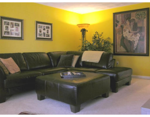 6 Arcadia Road Billerica, MA 01821 - Photo 3 of 10 a living room with furniture and a floor to ceiling window