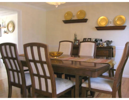6 Arcadia Road Billerica, MA 01821 - Photo 6 of 10 a view of a dining room with furniture and a mirror