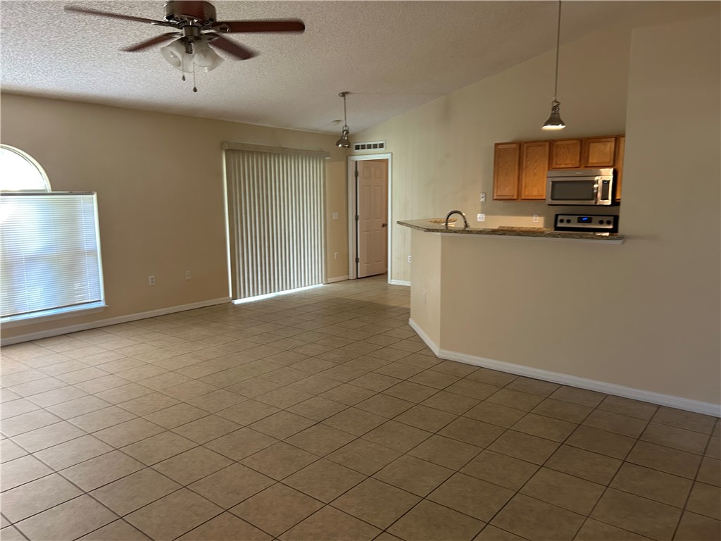 675 Forster Avenue Sebastian, FL 32958 - Photo 11 of 15 a view of a kitchen with a sink and cabinets