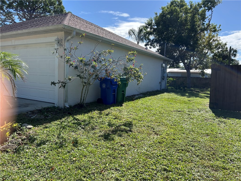 675 Forster Avenue Sebastian, FL 32958 - Photo 3 of 15 a view of a backyard