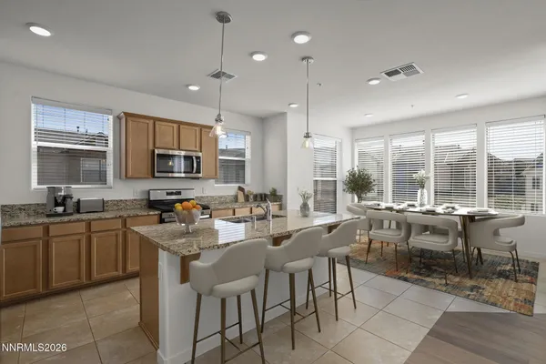 a view of a dining room kitchen livingroom and furniture