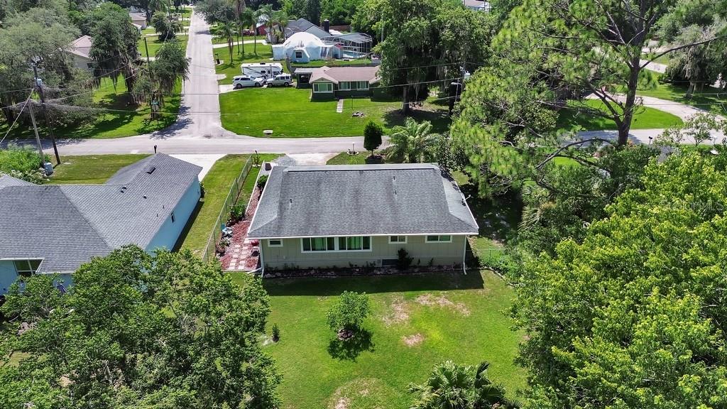 50 Bonita Road DeBary, FL 32713 - Photo 37 of 43 a aerial view of a house with a yard and lake view