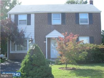 1616 Hampton Road Havertown, PA 19083 - Photo 1 of 9 a front view of a house with garden