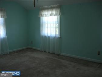 1616 Hampton Road Havertown, PA 19083 - Photo 5 of 9 a view of an empty room with a window
