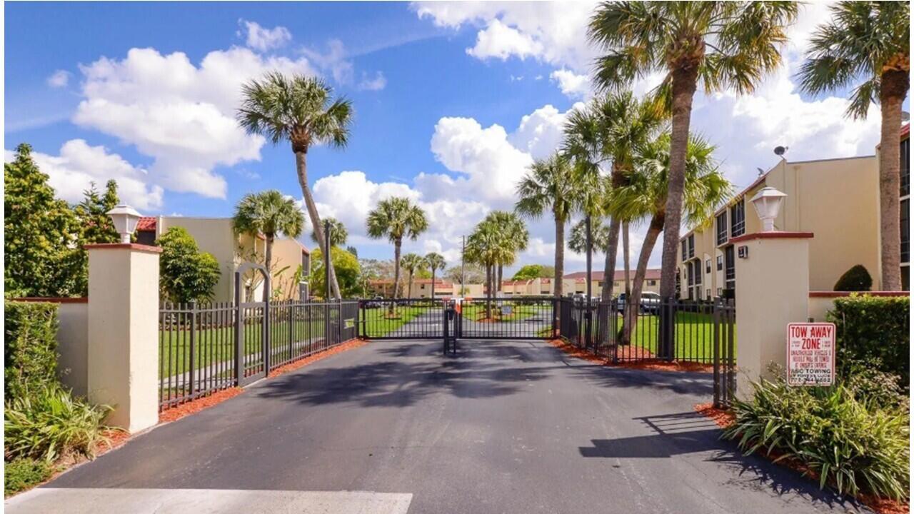2050 Oleander Boulevard, Unit 7301 Fort Pierce, FL 34950 - Photo 5 of 12 a view of a park with palm trees