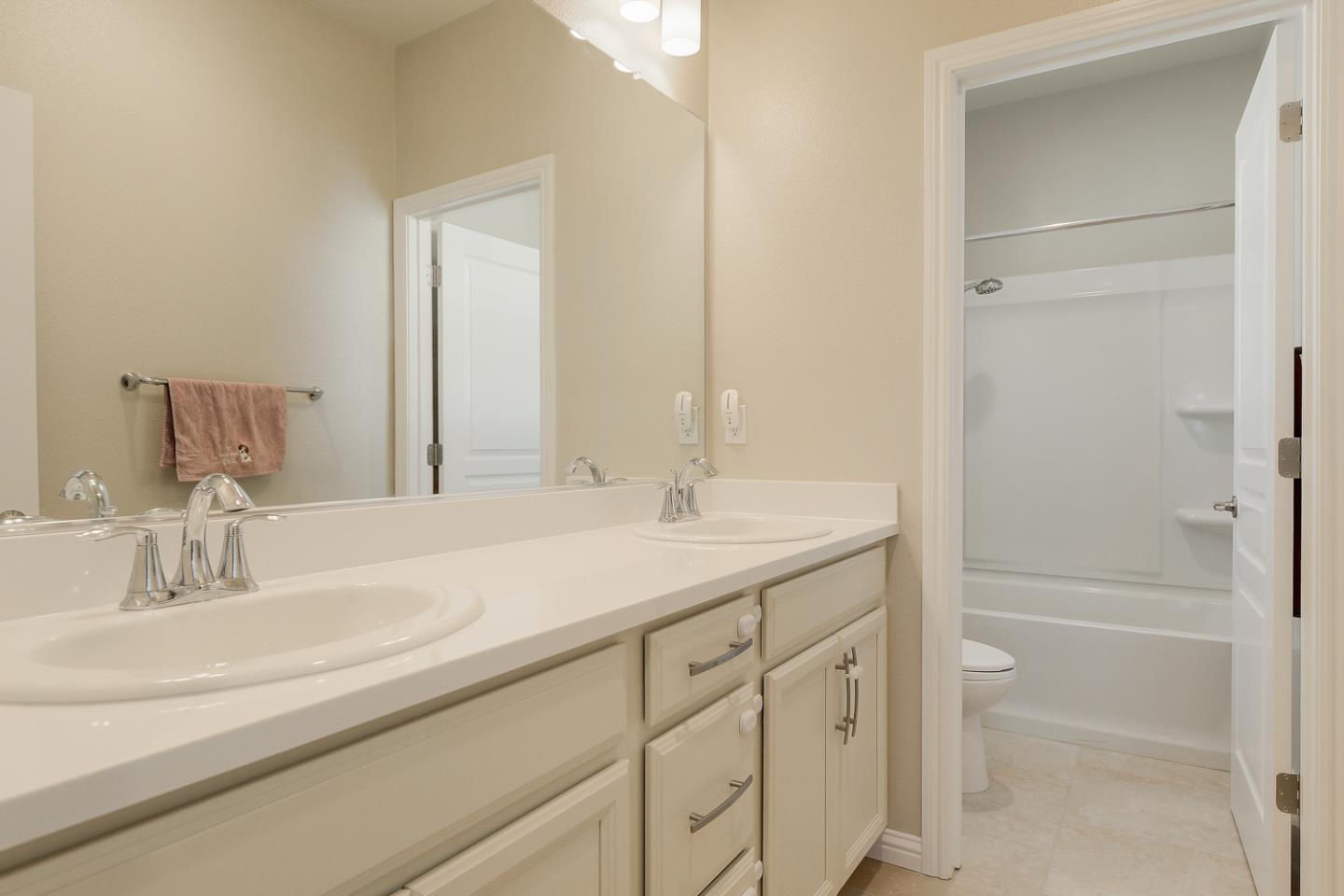 2505 Admiral Circle Hayward, CA 94545 - Photo 15 of 24 a bathroom with a sink and a mirror
