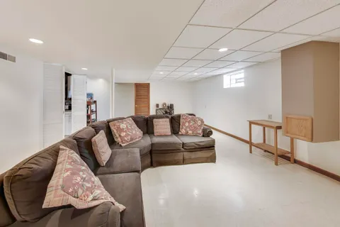 a living room with furniture and a couch