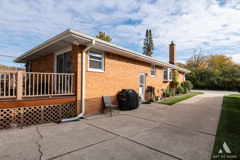 a front view of a house with outdoor space