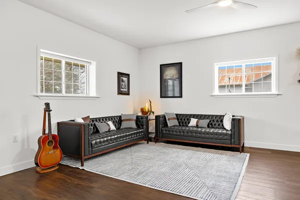 a living room with furniture and a window