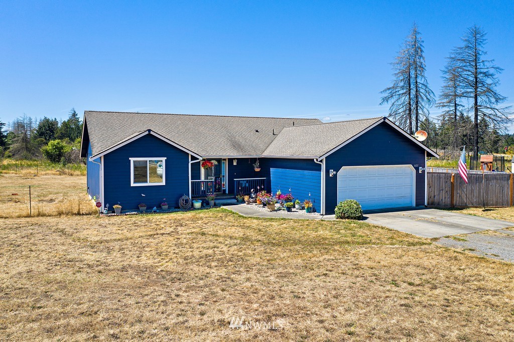 5121 183rd Lane Southwest Rochester, WA 98579 - Photo 3 of 31 a view of a house with a yard