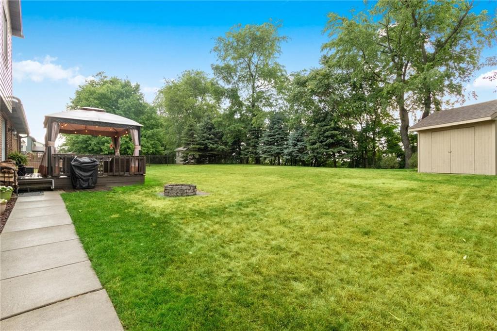 174 Cedar Ridge Drive Monaca, PA 15061 - Photo 18 of 22 The rear yard is fenced & flat, providing a safe area for pets or children. A shed with electric provides additional storage.