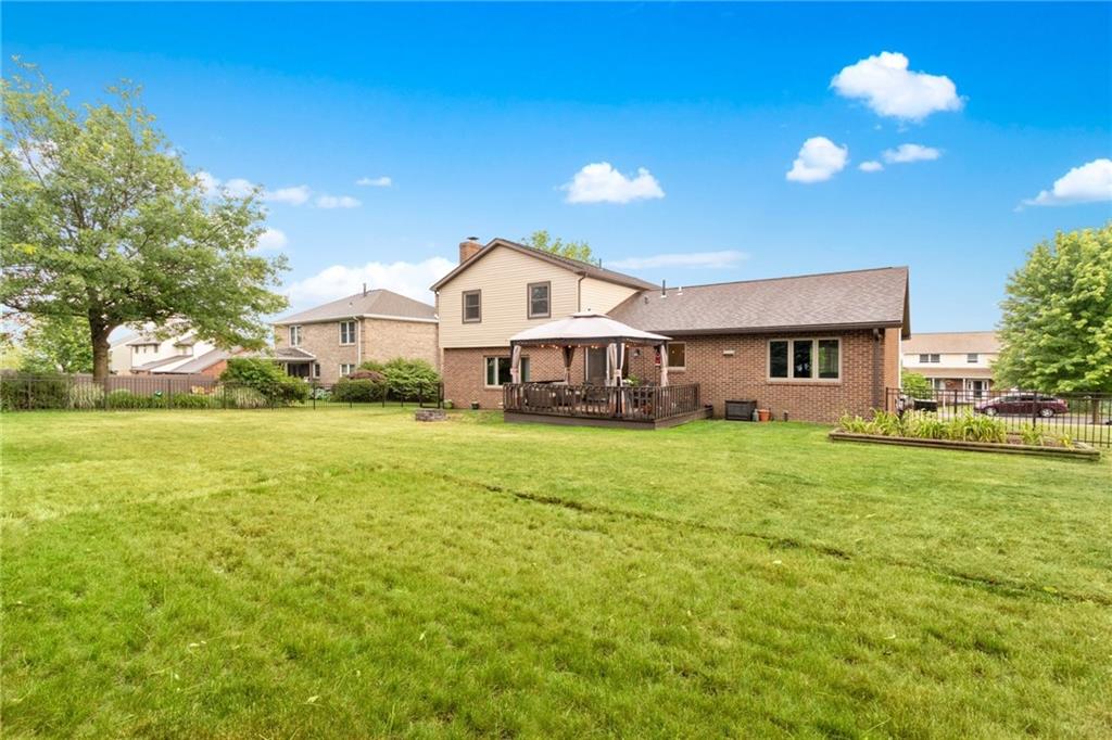 174 Cedar Ridge Drive Monaca, PA 15061 - Photo 21 of 22 Raised garden beds are part of the perfectly manicured and beautifully landscaped yard.