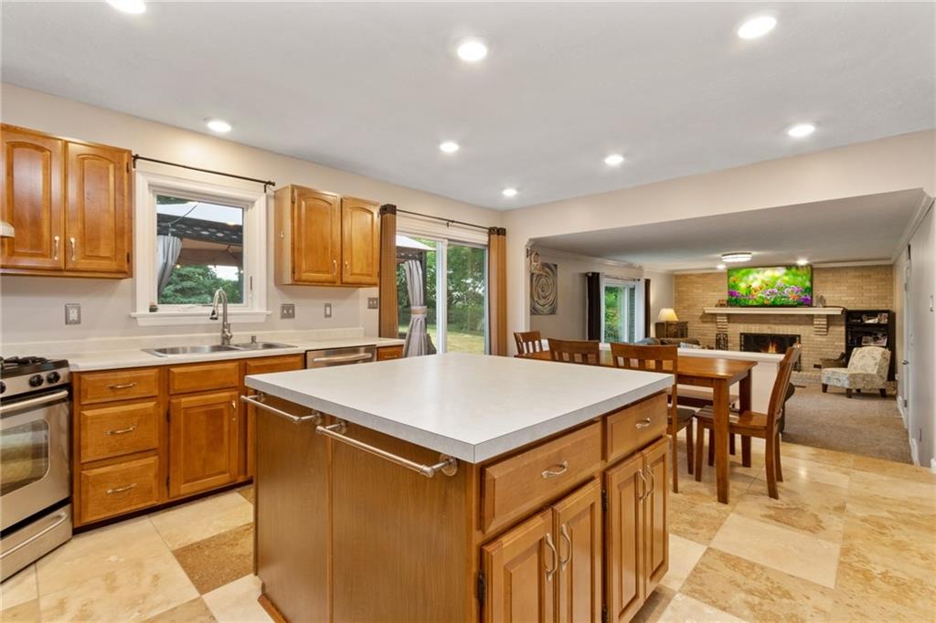 174 Cedar Ridge Drive Monaca, PA 15061 - Photo 7 of 22 The kitchen is open to the familyroom contributing to the social friendly atmosphere.