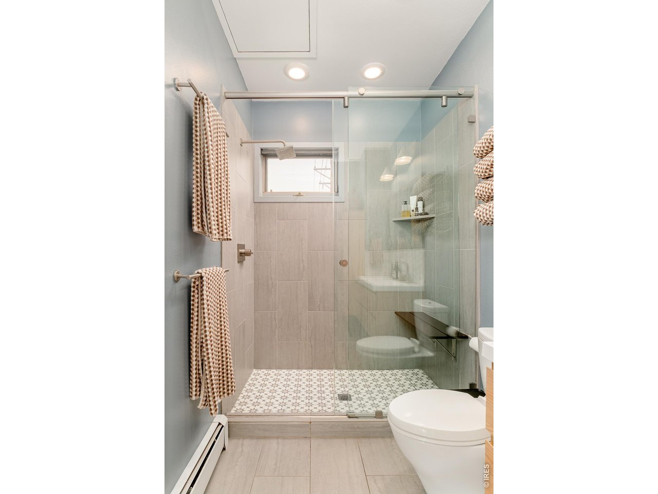 2215 20th Street Boulder, CO 80302 - Photo 21 of 42 a bathroom with a toilet and a shower
