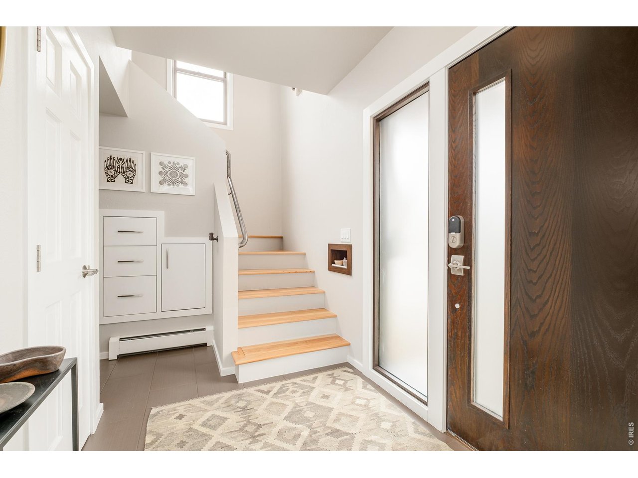 2215 20th Street Boulder, CO 80302 - Photo 4 of 42 a view of entryway with white walls and stairs