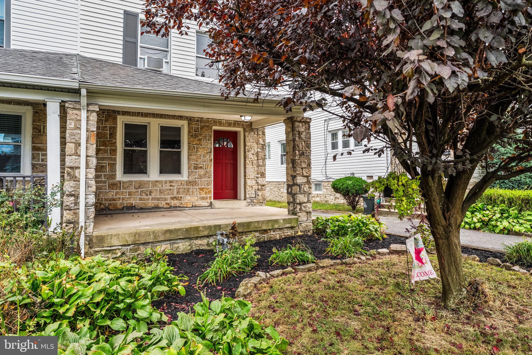 a front view of a house with a porch