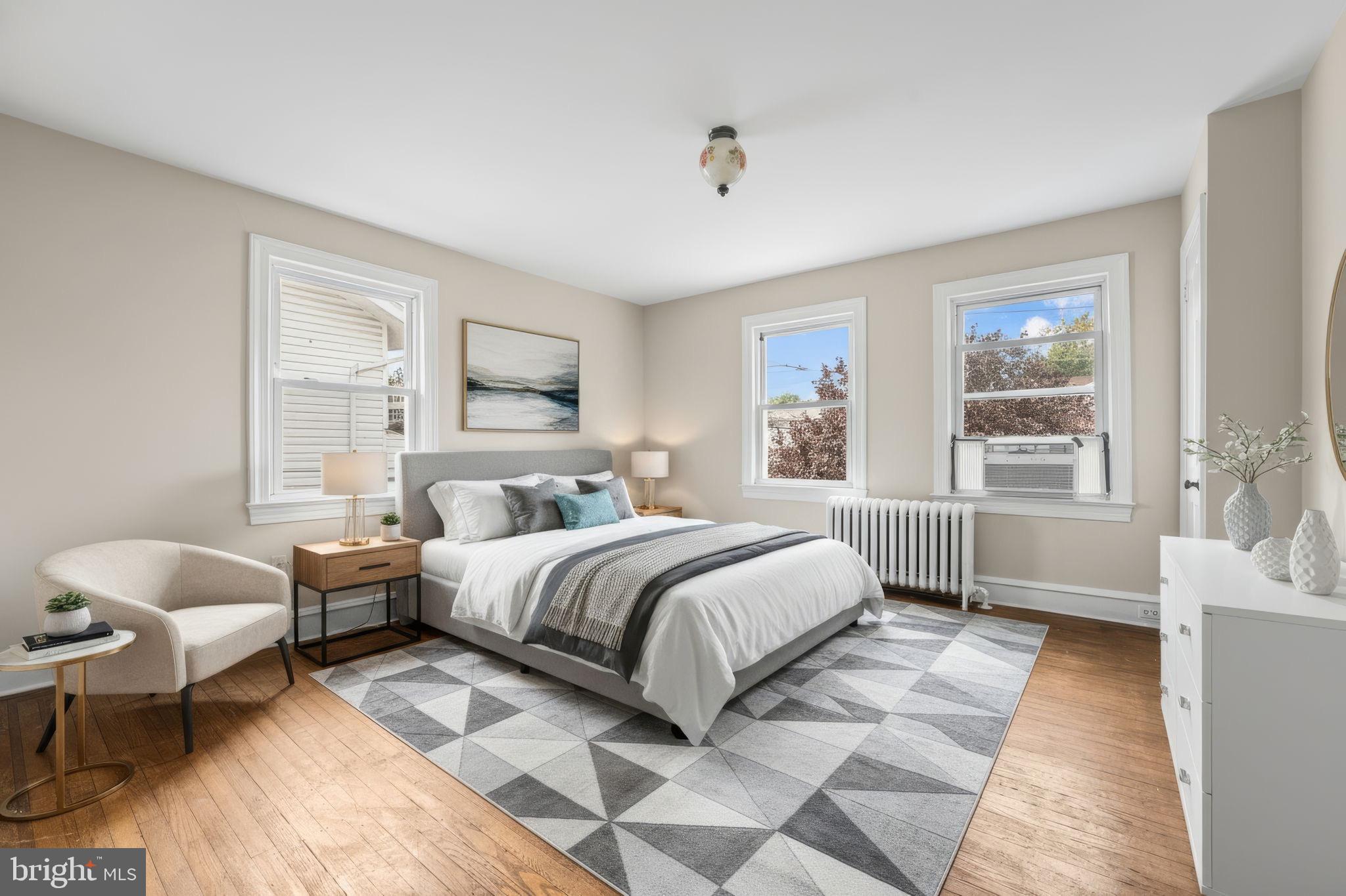 96 Drexel Avenue Lansdowne, PA 19050 - Photo 24 of 58 a bedroom with a bed and windows