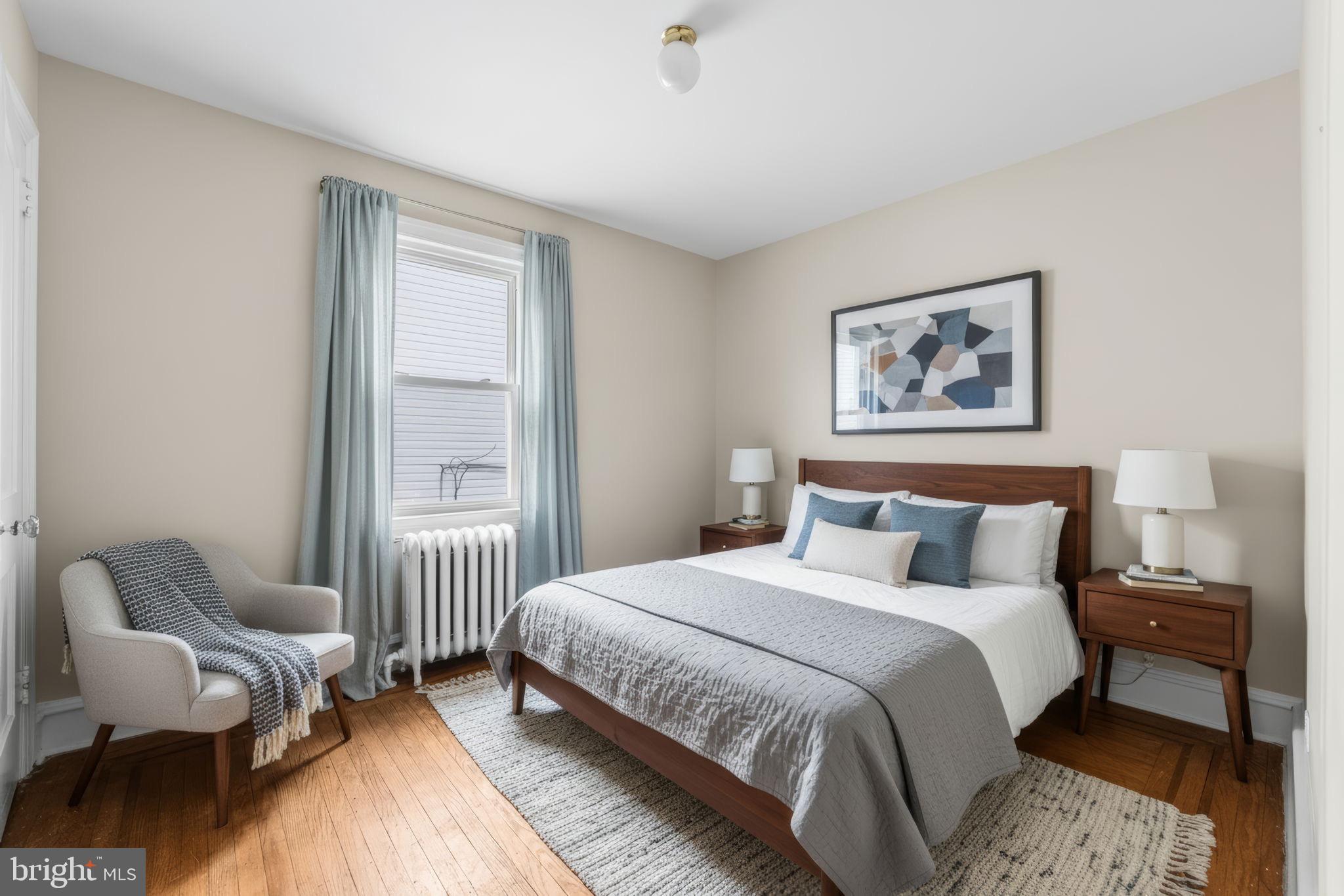 96 Drexel Avenue Lansdowne, PA 19050 - Photo 27 of 58 a bedroom with a bed and a couch