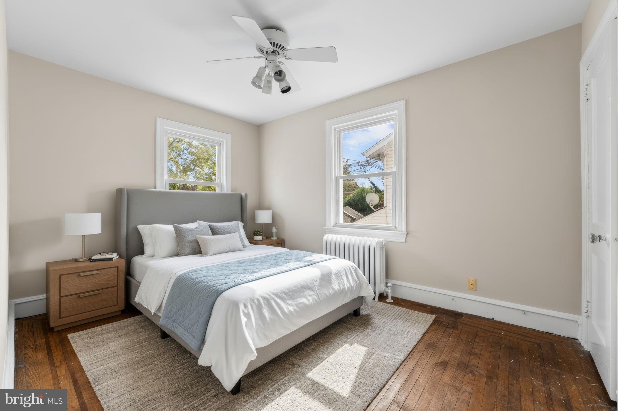 96 Drexel Avenue Lansdowne, PA 19050 - Photo 29 of 58 a bedroom with a bed painting on the wall and a window